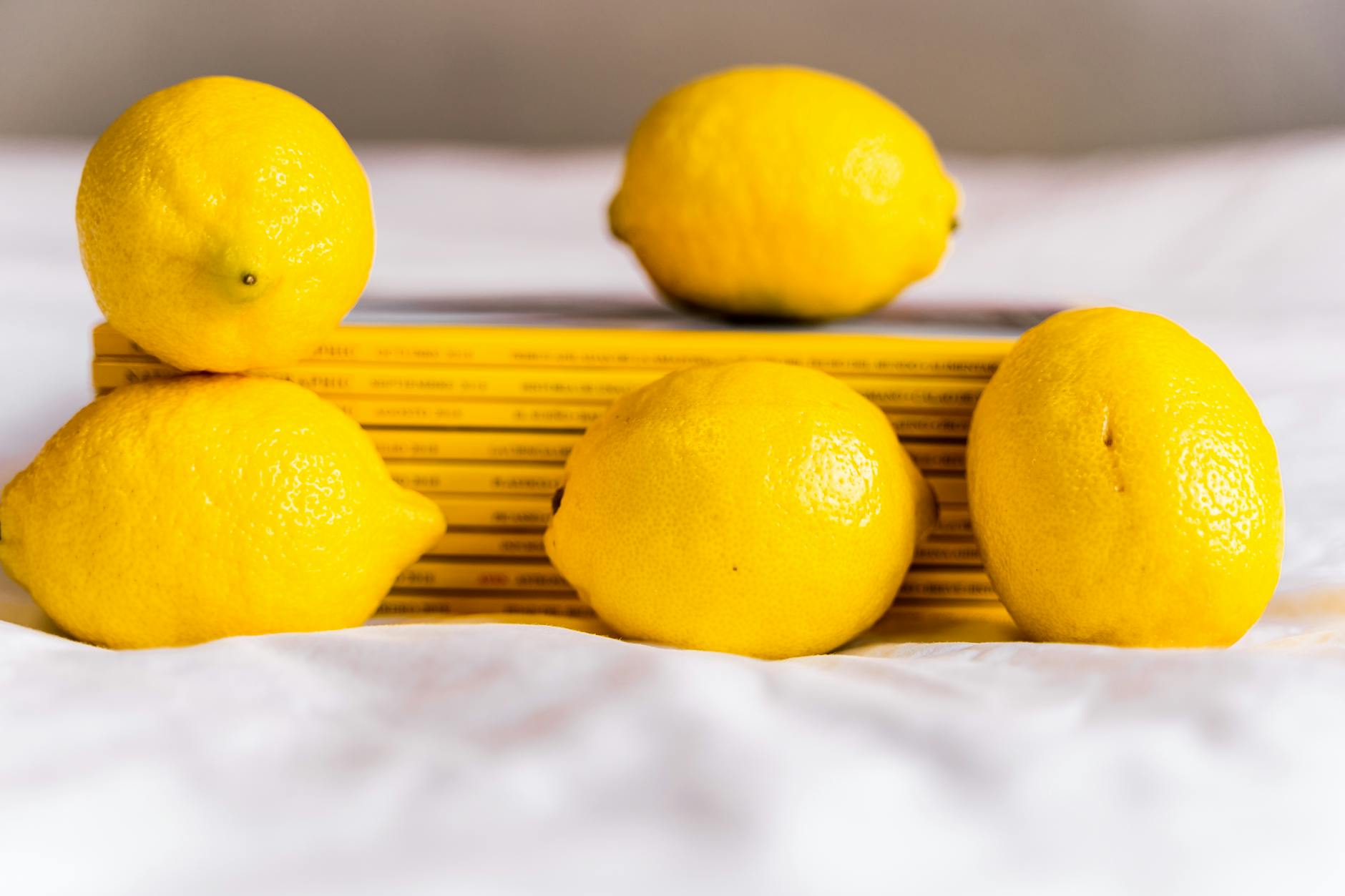 Fresh lemons arranged thoughtfully, symbolizing renewal and fresh starts